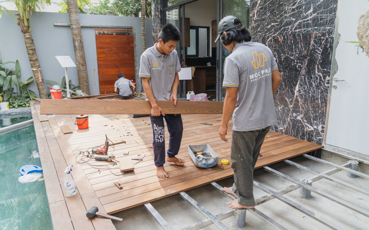 Construction professional installing accessibility equipment during aging-in-place renovation project in Utah