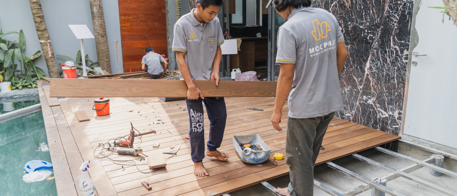 Construction professional installing accessibility equipment during aging-in-place renovation project in Utah