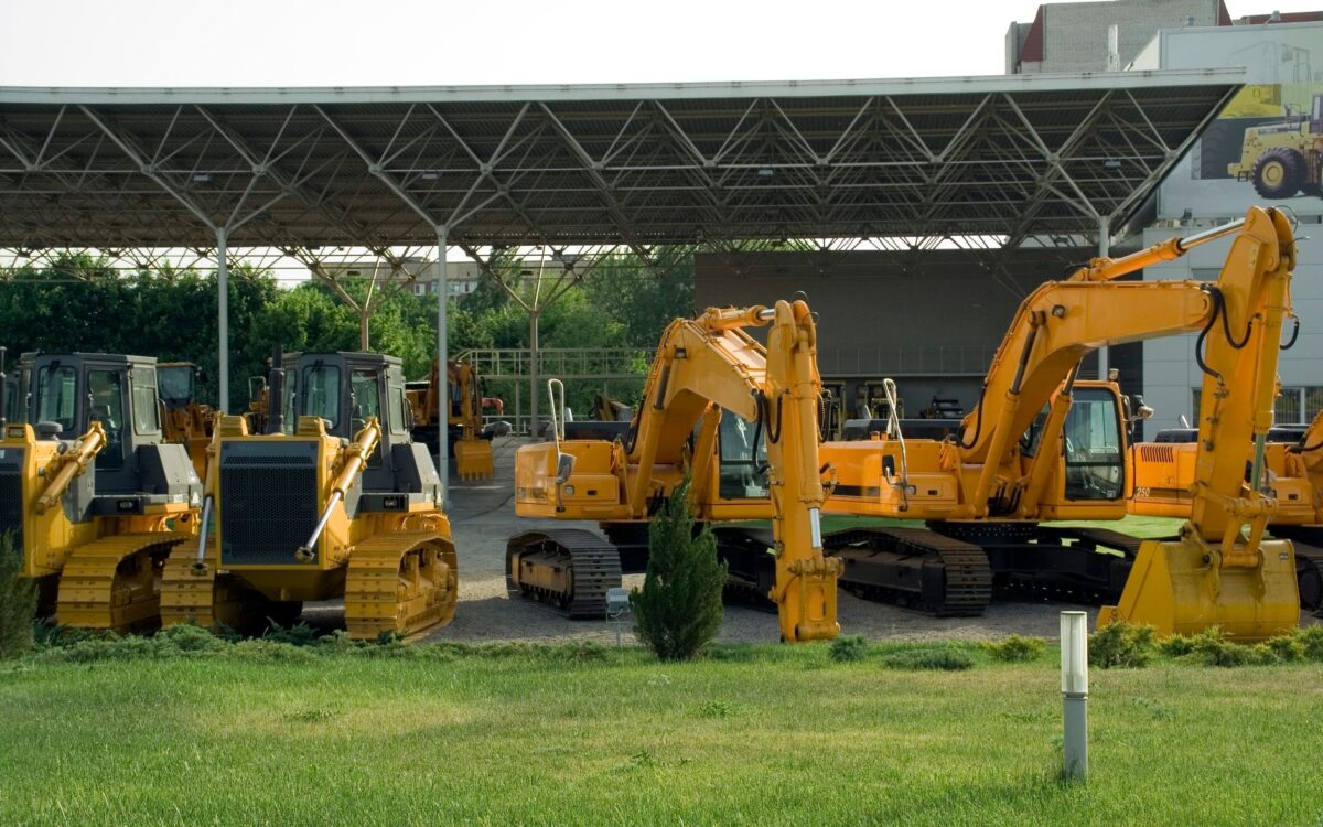 Construction equipment rental strategy Utah showcasing heavy machinery fleet at rental yard