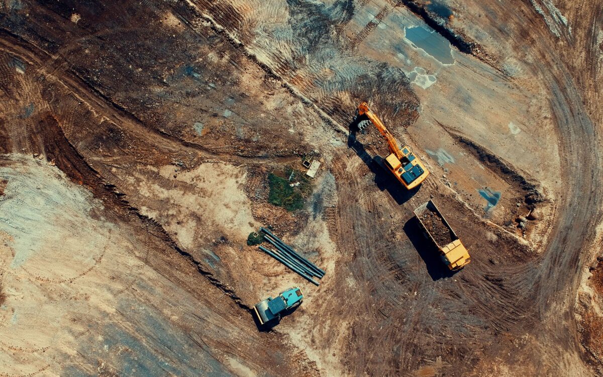Heavy equipment rental yard in Utah featuring excavators, bulldozers, and cranes ready for contractor projects