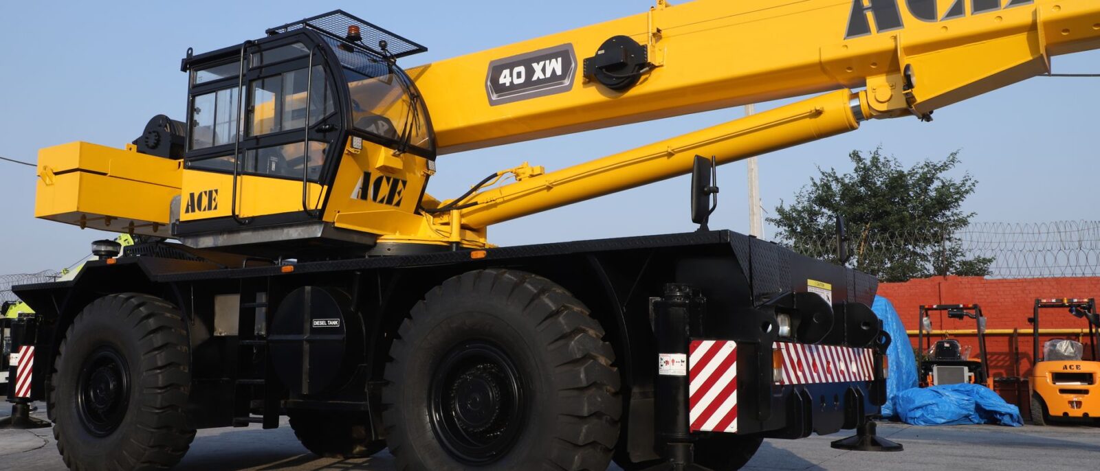 ACE 40 XW crane displayed at a construction site in Faridabad, Haryana, India.