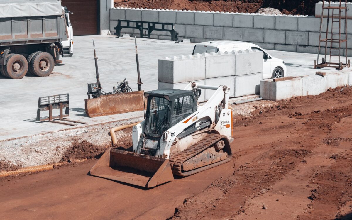 Equipment rental ROI comparison on active Utah construction project with multiple machines and workers