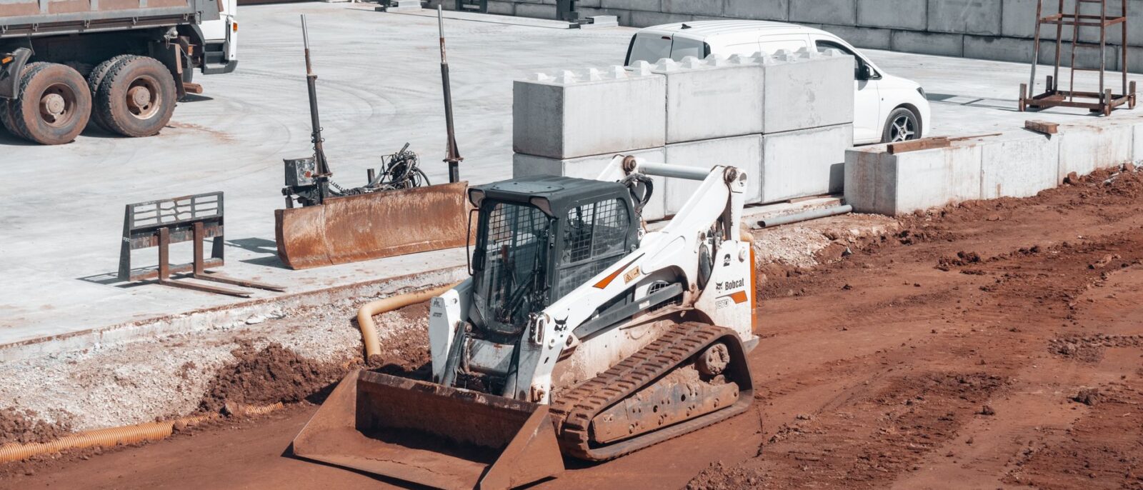 Equipment rental ROI comparison on active Utah construction project with multiple machines and workers