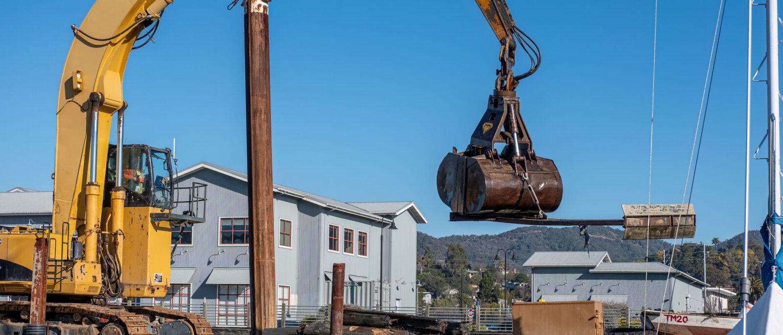Variety of most commonly rented construction equipment Utah including aerial lifts, excavators, and boom lifts on active job site